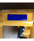 Close-up of Professional Pneumatic Nail Gun Compatible With 7116 Staples And Air Compressor For Upholstery with rubber grip.