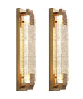 Slick Modern Crystal Wall Sconce Lights For Cozy Bedroom And Living Room Vibes With Up Down Led Wall Lamp Fixtures In A Solid 2 Pack For Indoor Outdoor Bathroom Decor, showcasing dual crystal LED lights on a gold fixture.