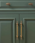 Twenty Pack Solid Brass Cabinet Pulls With Brushed Antique Brass Finish Six And Five Sixteenth Inch Hole Center attached to green cabinet
