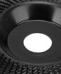 Close-up of Heavy Duty Tungsten Carbide Grinding Wheel 125mm Angle Grinder Disc with sharp teeth for sanding and polishing.