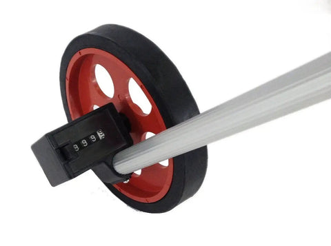 Close-up of Top Tier 1000 Ft Walking Wheel Tape Measure with four digit counter and aluminum handle for landscaping tasks.
