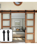 Sliding Barn Door Hardware Kit With J Shaped Hangers For 4 To 9.6 Ft Double Doors In Black Finish, installed in bedroom