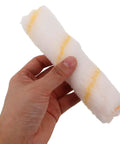 No Sweat Replacement Paint Roller Sleeve Covers For Silky Smooth Interior Wall Coatings And Textured Surfaces With Nearly Zero Lint Drop For Chill DIY Projects And Studio Quality Results Two Pack held in a hand.
