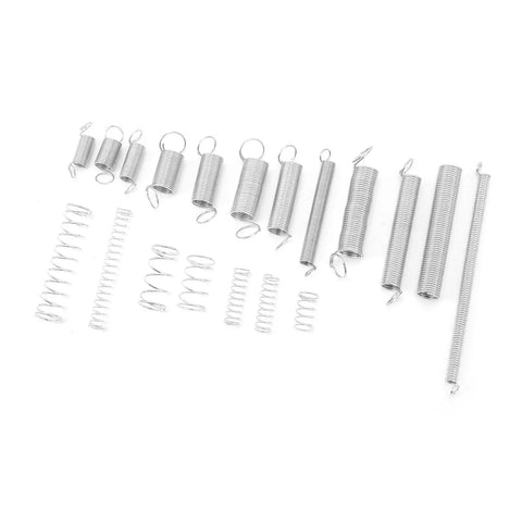 200 Piece Heavy Duty Compression And Extension Springs Assortment Kit With 20 Varied Styles Zinc Plated Steel Set Perfect For Car Mods, DIY Fixes, And Home Repairs In A Handy Storage Box. Assorted steel springs on white background