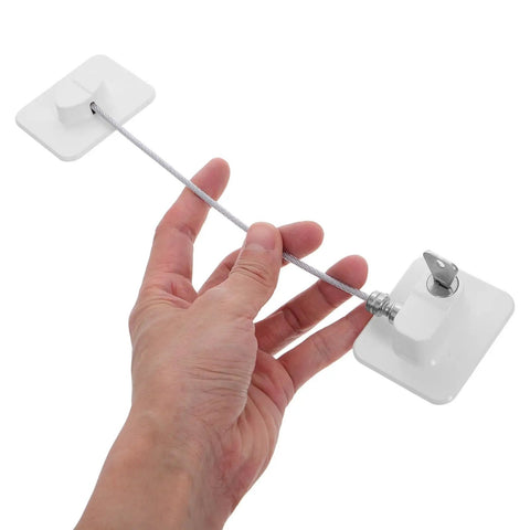 Hand holding Two Pack No Drill Kid Safe Fridge Lock And Cabinet Lock with white ABS and steel wire, easy install