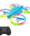 Indoor Kids Drone With LED Lights And 360 Flip Easy To Fly Mini RC Quadcopter Dual Batteries Beginner Friendly Toy Gift For Boys And Girls Light Blue Glow showing colorful LED rings and remote controller.