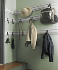 4 Foot GearTrack Channels For Garage Walls Beefy Heavy Duty Wall Mounts with coats and a backpack hanging