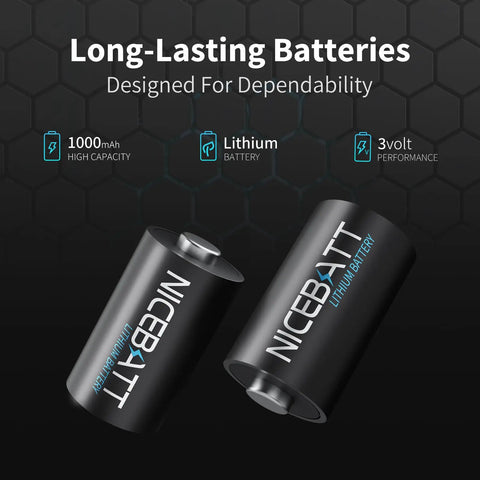 Knockout Long Lasting Cr2 3V Lithium Batteries For Nest Thermostats Golf Rangefinders Instax Cameras Non Rechargeable Leak Proof Heavy Duty Cell 1000Mah Bad Boy Power Source close up of two black 1000mAh lithium batteries on a dark background.