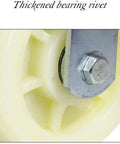 Close-up of a thickened bearing rivet on Heavy Duty Swivel Caster Wheels With 800 Kg Load Rating Set Of Four Durable Nylon Rollers.
