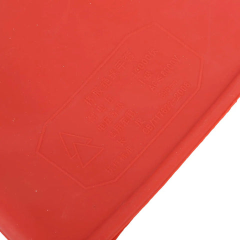 Heavy Duty Electrical Insulated Gloves Class 00 12KV 1.8mm Thick Rubber showing safety markings on red rubber surface.