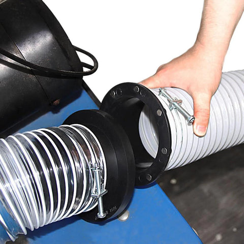 O'SKOOL 4-inch magnetic dust collector port fitting installed between a corrugated metal duct and gray flexible hose