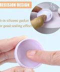 Close-up of hand holding a Five Pack 10ml Travel Containers Set For Creams, Lotions, And Makeup, showing silicone gasket for sealing.