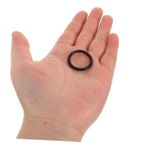 Person holding black NBR seal ring from 1200 Pcs NBR O Ring Assortment Kit Rubber Seal Rings For Plumbing And Auto Repair Leak Stop Gaskets