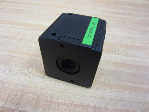 Hydraulic filter housing (glass bowl missing) Part 0821303500 showing a black cube design on a wooden surface