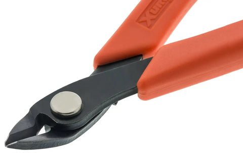 Close-up of Maxi-Shear Flush Cutters 2175 for jewelry making, featuring sharp blades and orange handles, perfect for bead stringing.