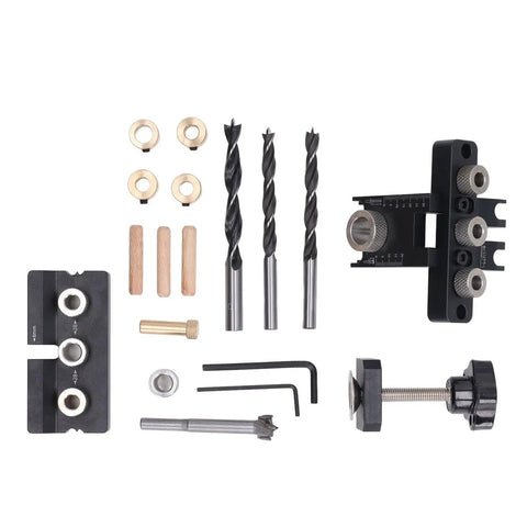 Heavy-Duty Doweling Jig Drill Kit With Adjustable Depth Locator And Three Pro Bits For Slick Woodworking Jobs and tools laid out on a white background.