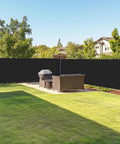 Chain Link Fence Privacy Screen 6 By 50 Feet, 90 Percent Privacy Outdoor Fence Cover With Brass Grommets installed in backyard