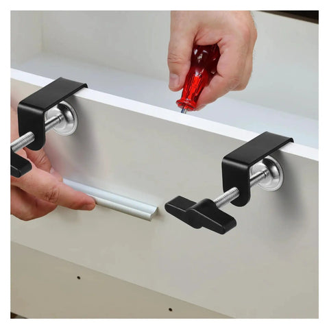 8 Piece Stainless Steel Desk C Clamps Set For Workbenches And Studio Desks in use on a white panel, showing adjustable screw clamp.