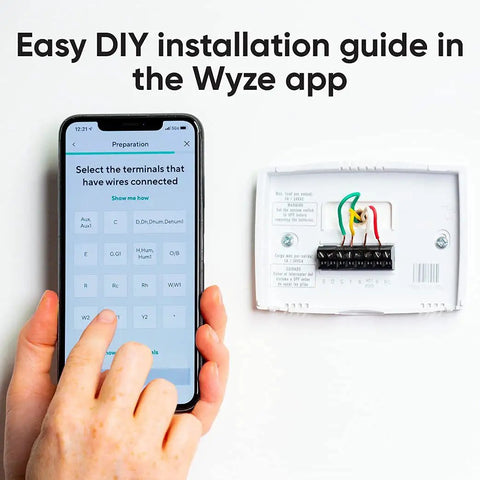 Person using app to install Smart WiFi Thermostat With App Control For Alexa And Google Assistant, No-Fuss DIY Install In Under 30 Minutes.