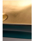 Close-up view of the edge of No Fuss Slick Finish Porcelain Vessel Sink For Above Counter Bathroom Vanities with smooth gold surface.