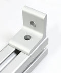 Inside Corner L Bracket Connector For 40 Series Aluminum Extrusion with 2 holes, shown mounted on aluminum extrusion.