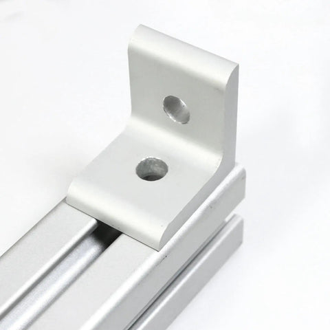 Inside Corner L Bracket Connector For 40 Series Aluminum Extrusion with 2 holes, shown mounted on aluminum extrusion.