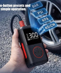 Cordless Tire Inflator Air Compressor For Land Rover Range Rover Electric Mla Flex Ev 2025 2026 with digital gauge in hand.