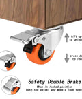Close-up of Two Inch Caster Wheels Set Of Four With Locking Swivel Casters Heavy Duty Load Capacity Up To 600 Lbs showing safety brake mechanism.