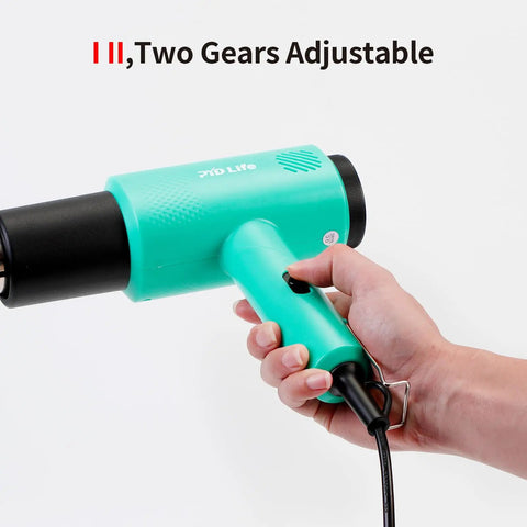 Mint Green Heat Blower Gun With Foldable Handle For Sublimation Blanks And Shrink Wrap Film, 110V 1300W Hot Air Gun in hand