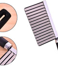 Crinkle potato cutter with stainless steel blade and black handle, angled front view