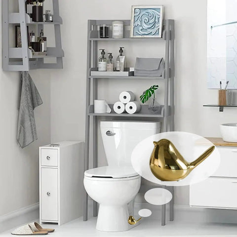 Installed Gold Ceramic Bird Toilet Bolt Covers Set Of 2 Decorative Toilet Bolt Caps For Bottom Of Toilet Easy Install Bathroom Decor Accessories Cute And Functional, showing a close-up of the bird-shaped gold ceramic cap at the base of the toilet.