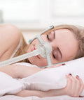 Woman sleeping with Replacement AirFit N20 Nasal Cushion Two Pack for a Reliable Seal and Comfy Wear on the Original Frame Medium Fit