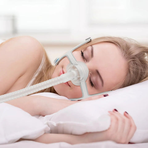 Woman sleeping with Replacement AirFit N20 Nasal Cushion Two Pack for a Reliable Seal and Comfy Wear on the Original Frame Medium Fit