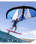 Surfer using Inflatable Wing Foil For Kitesurfing And Windsurfing Pro Durable Waterproof Wing Surfboard Sail on wave