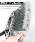 Heavy Duty Angle Broom Featuring Rigid Bristles And An Extended Handle That Smashes Through Stubborn Dirt And Leaves On Patios Garages And Commercial Floors Like Butter with stiff split-end bristles.