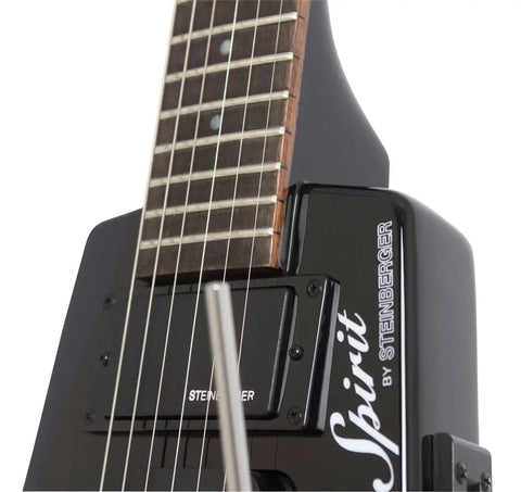 Spirit GT Pro Deluxe Black Electric Guitar With Gig Bag Maple Body Locking Tremolo R Trem System Humbucker Neck Pickup And Single Coil Middle Pickup Lightweight Built For Stage Ready Studio And Street Jams close-up of black headless body and neck