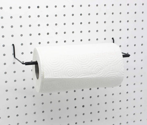 Extendable Pegboard Paper Towel Holder For Standard Pegboard Boss Shop Ready Fits 1/8 And 1/4 Inch Hole Spacing Holds Rolls Up To Seven Inch Diameter And Fourteen Inch Length Heavy Duty Metal With Black Finish Two Pack holding a paper towel roll on a pegboard