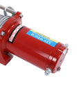 Close-up of Heavy Duty 4500lb Electric Winch Kit For Trucks And Trailers showing robust motor and steel cable.