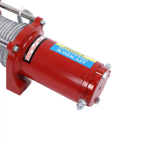 Close-up of Heavy Duty 4500lb Electric Winch Kit For Trucks And Trailers showing robust motor and steel cable.