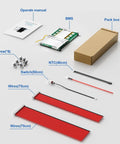 Components of No Fuss Smart Battery Management Board including BMS, manual, screws, wires, and switch.