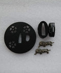 Dope Samurai Sword Tsuba Fuchi Kashira Menuki Iron Set TDZH02, round iron tsuba with floral cutouts and detailed menuki on white background