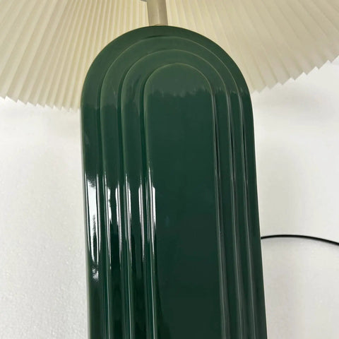 Close-up of LED Bedside Table Lamp With Pleated Shade Cream Ceramic Retro Rural Style Ambient Light, green ceramic base detail.
