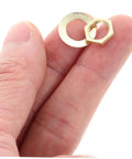 Hand holding a golden metal washer and nut from Clock Movement Nut Set With Washers 14 Pcs Replacement Parts Kit For DIY Clock Repair And Small Mechanism Assembly Easy Install And Durable Hardware For Timepiece Enthusiasts