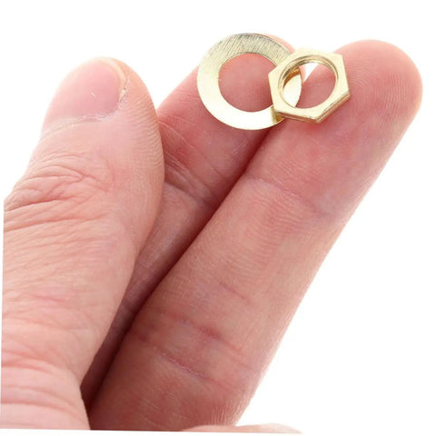 Hand holding a golden metal washer and nut from Clock Movement Nut Set With Washers 14 Pcs Replacement Parts Kit For DIY Clock Repair And Small Mechanism Assembly Easy Install And Durable Hardware For Timepiece Enthusiasts