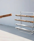 Dang Tough Heavy Duty Adjustable Cantilever Storage Rack Holds 440 Pounds Easy Shift Pipe And Lumber Organizer Shelf No Drill Freestanding Garage Rig For Workshop Space with lumber being loaded.