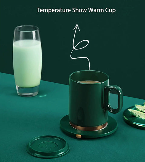 Smart Thermostatic Usb Coffee Mug Warmer Set To Keep Your Daily Brew Hot And Smooth Without Any Cold Cup Vibes Electric Heater Coaster on green table.