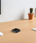 Anti Slip Pads For Chair Legs And Furniture With Wheels on wooden desk near plant and computer accessories, minimalist design.