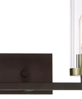Close-up of Ainsley Court Vanity Bath Light Two Light Fixture in Aged Kinston Bronze with Brushed Brass Highlights, clear ribbed glass.