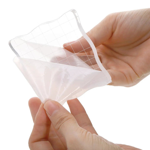 12 Piece Clear Acrylic Stamp Block Set With Assorted Sizes For Scrapbooking And Card Making, Transparent Mounting Blocks With Grid Lines For Precise Alignment, Must Have For Crafts Stamping Projects And DIY Cards, clear acrylic block in hand
