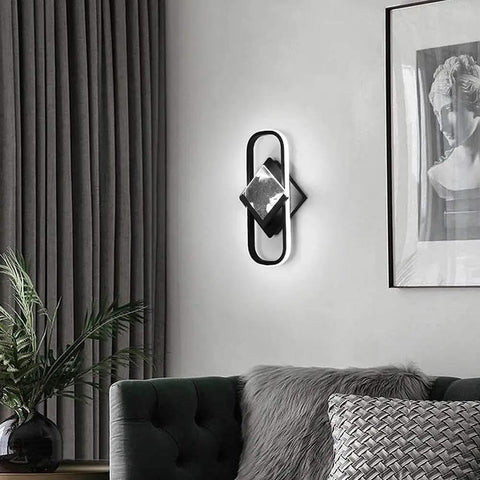 Modern Led Acrylic Indoor Wall Sconce With Dimmable Remote Control And Warm Adjustable Glow Solid Pick For Bedroom Living Room And Office Space Major Vibe Upgrader mounted beside a couch.